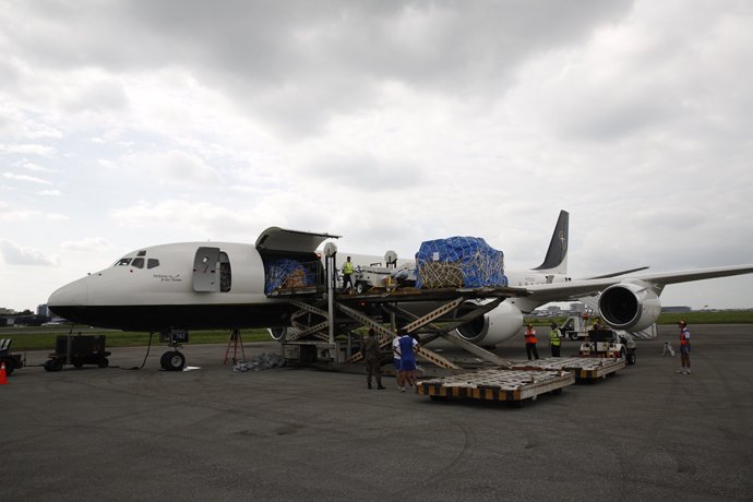 Our DC-8 has already arrived safely in Ecuador (April 20). Equipment is being unloaded for the emergency field hospital.