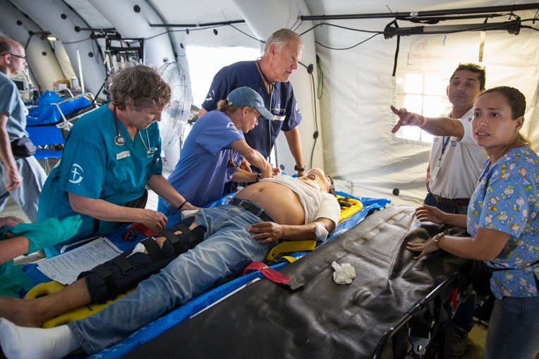 Staff at work in the field hospital in Chone, Ecuador. Mabel Lojan is at far right.