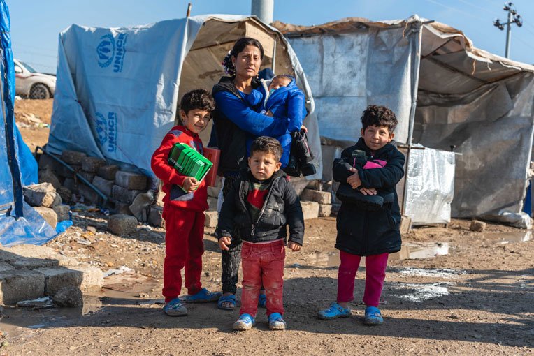 Ariya and her children received warm clothing and shoes as winter approaches.