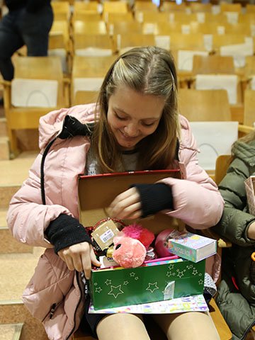 Girl explores shoebox gift