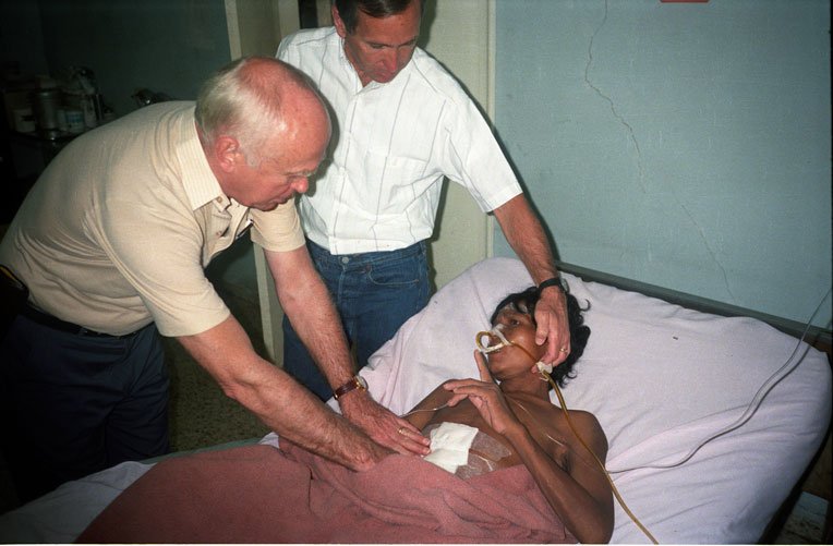 Drs. Lowell (left) and Richard (right) Furman see a patient in Honduras