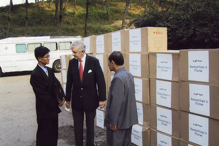 amaritan’s Purse Board Member Dr. Melvin Cheatham presents medical supplies to a delegation in North Korea.