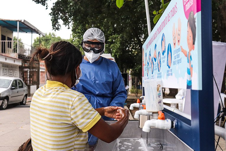 Our staff teach proper hand-washing in Colombia help prevent the spread of COVID-19.