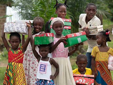 Group in Liberia with shoebox gifts