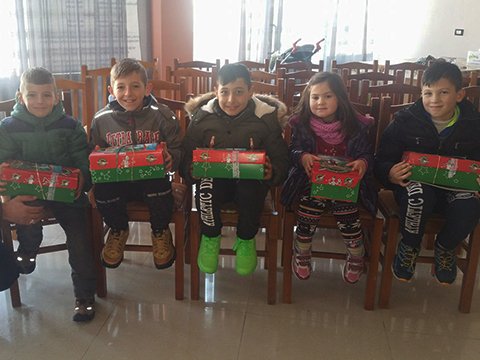 Group of children with shoebox gifts
