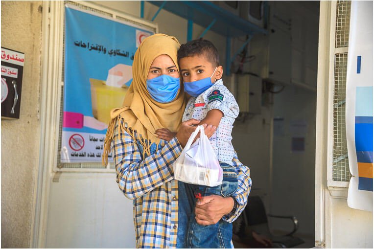 Raja and her son are grateful for the clinic’s free services.