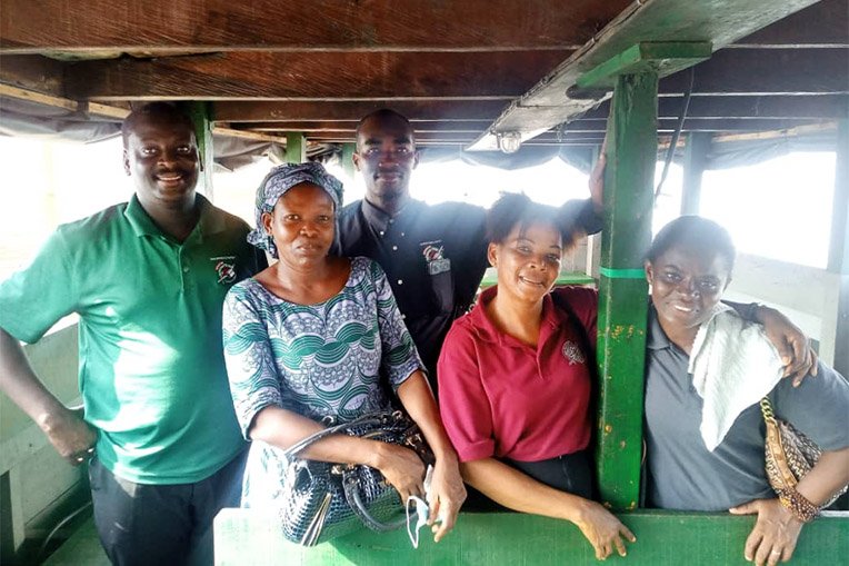 Flore (second from left) and Operation Christmas Child representatives traveled to Vridi Ako to conduct an outreach event.