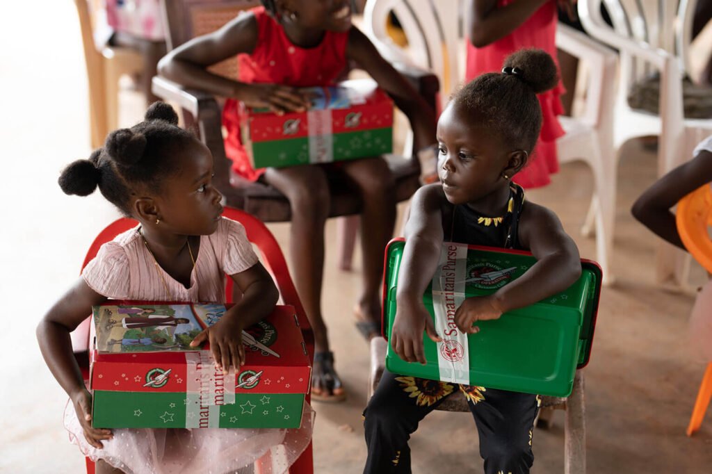 Saramaccan children receive Operation Christmas Child shoebox gifts at a recent outreach event in Suriname.