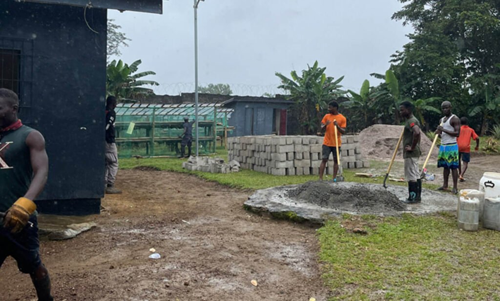 Inmates in Liberia’s prison system are often responsible for maintaining the property and living quarters.