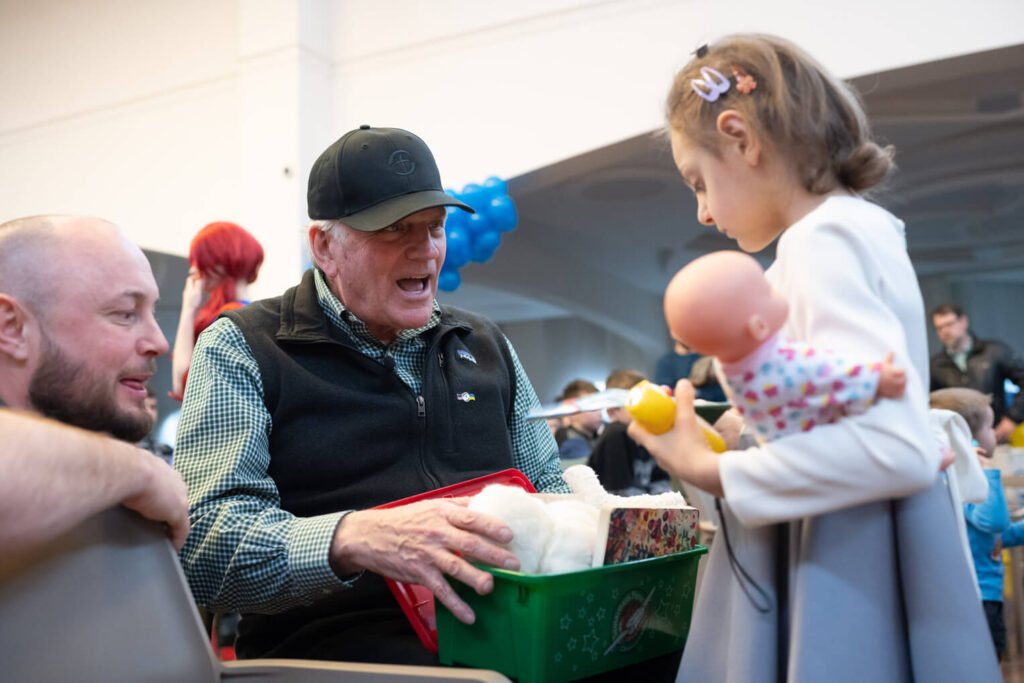 Samaritan’s Purse President Franklin Graham celebrates 200 millionth shoebox gift with 4-year-old Natalya.